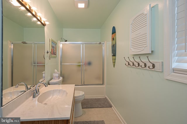 104 120th St Unit D82, Ocean City, MD 21842 - full bathroom featuring toilet, vanity, bath / shower combo with glass door, and baseboards