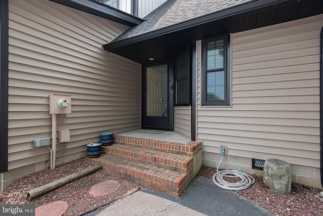 104 120th St Unit D82, Ocean City, MD 21842 - property entrance featuring a shingled roof and crawl space