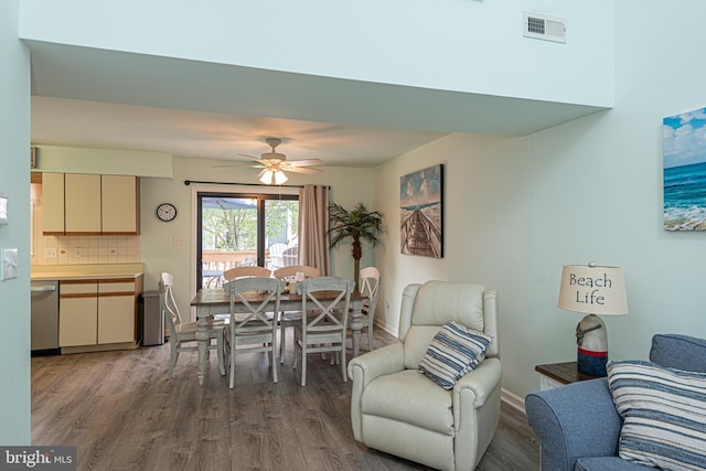 104 120th St Unit D82, Ocean City, MD 21842 - dining area featuring wood finished floors, a ceiling fan, and baseboards
