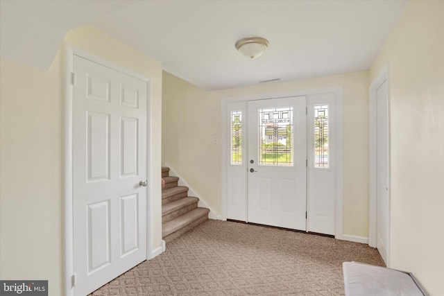 869 Primrose Dr, Warminster, PA 18974 - carpeted foyer featuring stairway and baseboards