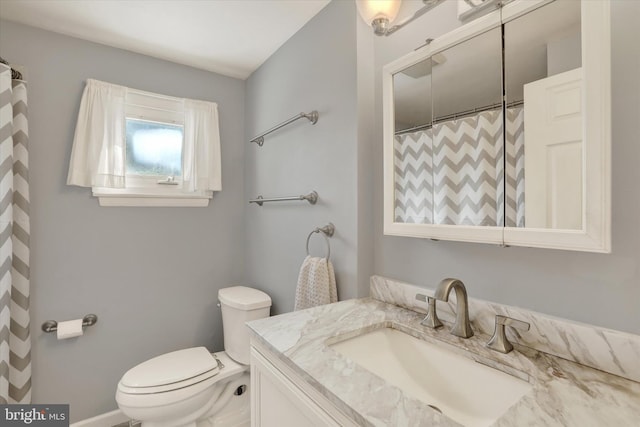 869 Primrose Dr, Warminster, PA 18974 - full bathroom featuring vanity, toilet, and a shower with shower curtain