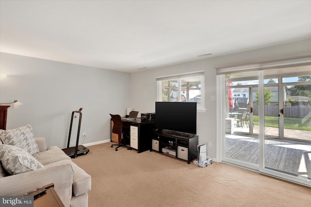 869 Primrose Dr, Warminster, PA 18974 - living room with light colored carpet, baseboards, and a desk