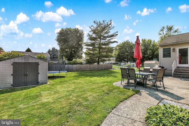 869 Primrose Dr, Warminster, PA 18974 - view of yard featuring a trampoline and a patio
