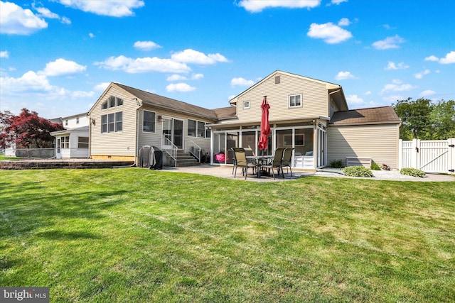 869 Primrose Dr, Warminster, PA 18974 - back of house with a gate, a patio area, entry steps, and a sunroom