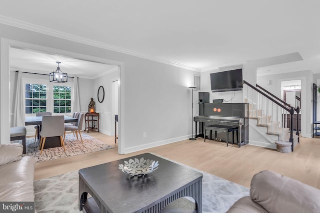 1606 Montmorency Dr, Vienna, VA 22182 - living room featuring wood finished floors, stairway, a chandelier, ornamental molding, and baseboards