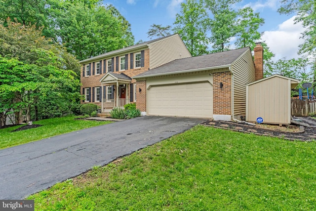 1606 Montmorency Dr, Vienna, VA 22182 - view of front of house featuring asphalt driveway, a garage, brick siding, a chimney, and a front lawn