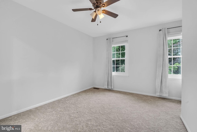 1606 Montmorency Dr, Vienna, VA 22182 - carpeted empty room with healthy amount of natural light, ceiling fan, and baseboards