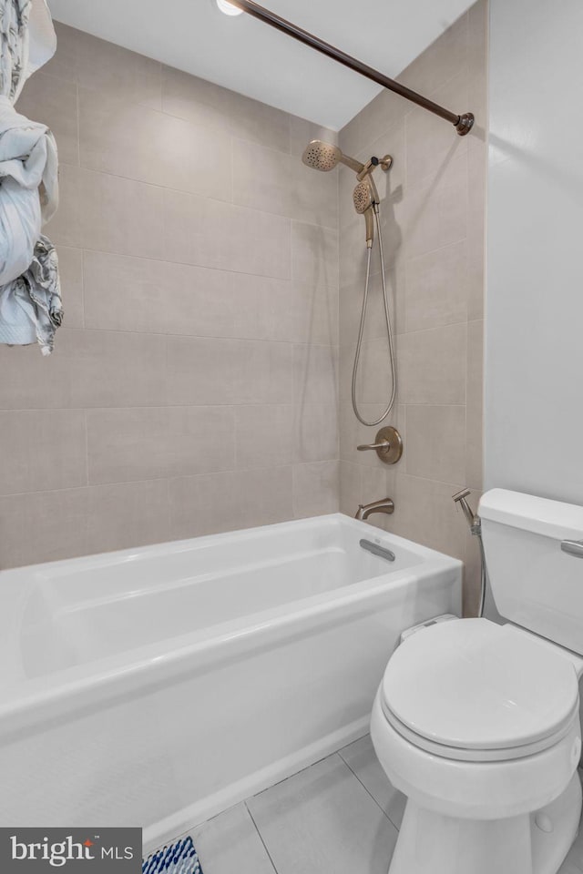 1606 Montmorency Dr, Vienna, VA 22182 - full bathroom featuring bathing tub / shower combination, toilet, and tile patterned floors