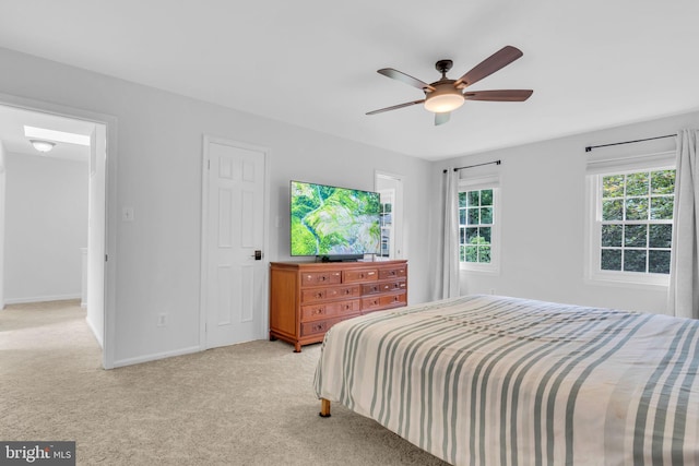 1606 Montmorency Dr, Vienna, VA 22182 - bedroom featuring light carpet, baseboards, and a ceiling fan
