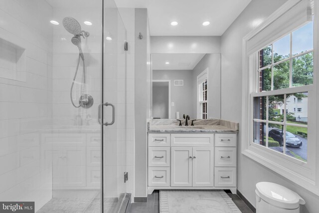 1606 Montmorency Dr, Vienna, VA 22182 - full bathroom featuring a shower stall, vanity, baseboards, toilet, and recessed lighting
