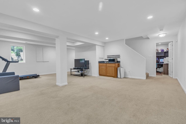 1606 Montmorency Dr, Vienna, VA 22182 - basement featuring light colored carpet, recessed lighting, stairway, and baseboards
