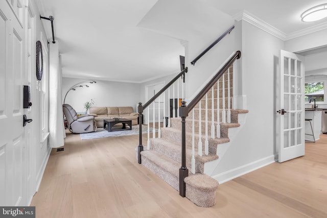 1606 Montmorency Dr, Vienna, VA 22182 - foyer featuring wood finished floors, stairs, ornamental molding, and baseboards
