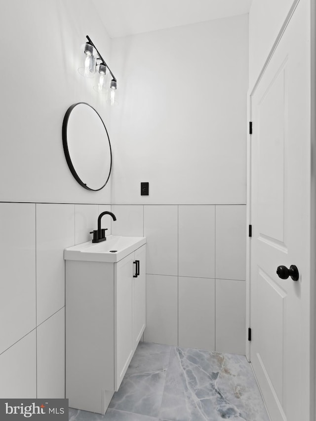 2331 N Front St, Philadelphia, PA 19133 - bathroom with vanity and tile walls
