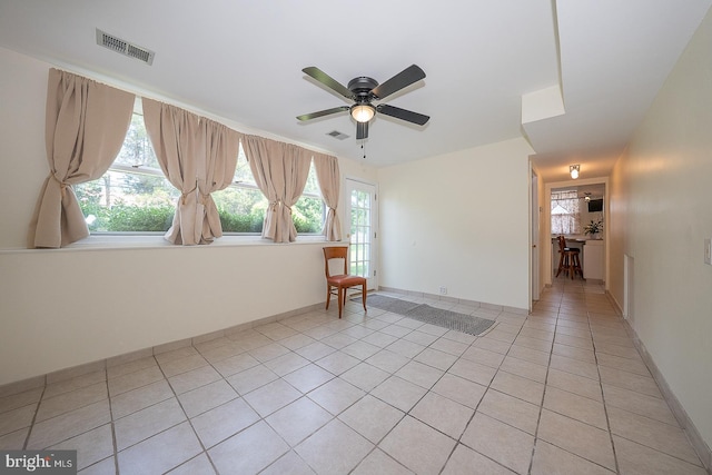 405 Garden Ln, Aston, PA 19014 - unfurnished room with light tile patterned flooring, a ceiling fan, and healthy amount of natural light