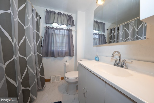 405 Garden Ln, Aston, PA 19014 - bathroom featuring vanity, toilet, marble look tiles, and curtained shower