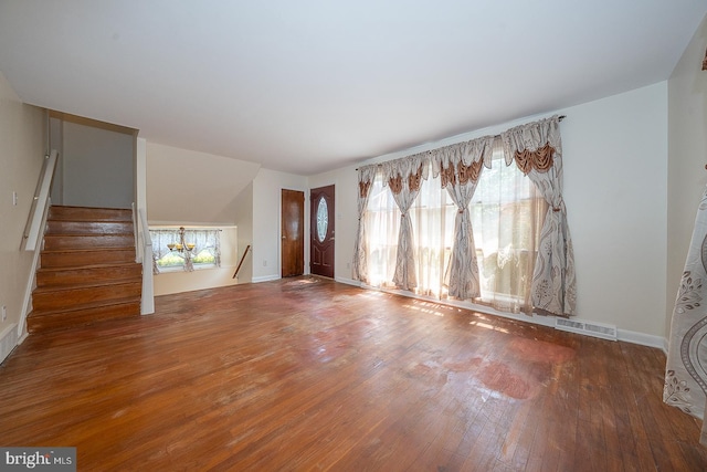 405 Garden Ln, Aston, PA 19014 - unfurnished living room featuring hardwood / wood-style floors, baseboards, and stairs
