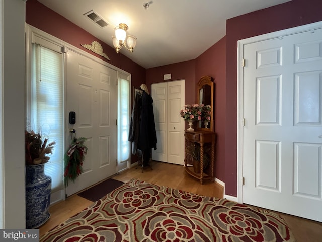 7324 Summerwind Cir, Laurel, MD 20707 - foyer entrance featuring baseboards and light wood finished floors