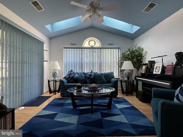 7324 Summerwind Cir, Laurel, MD 20707 - living area with a skylight, a ceiling fan, lofted ceiling, and wood finished floors
