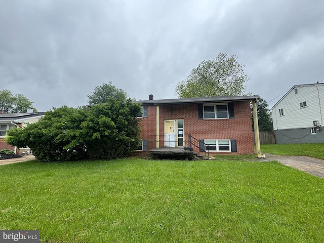8541 Lucerne Rd, Randallstown, MD 21133 - bi-level home with brick siding and a front yard
