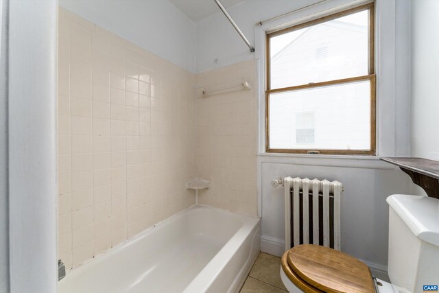 1316 Chesapeake St, Charlottesville, VA 22902 - bathroom with radiator heating unit, toilet, shower / bath combination, and tile patterned flooring