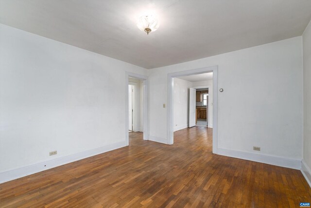 1316 Chesapeake St, Charlottesville, VA 22902 - empty room featuring wood-type flooring and baseboards