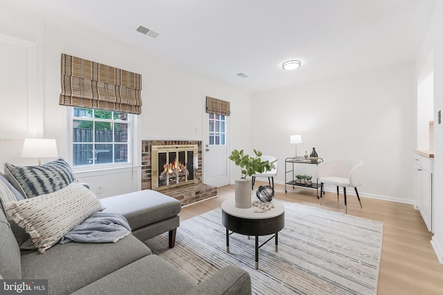4377 Cherry Hill Rd, Arlington, VA 22207 - living area featuring light wood-type flooring and a fireplace