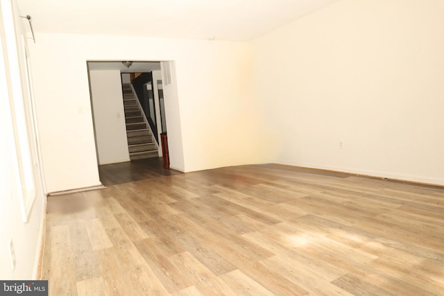 9216 Crandall Rd, Lanham, MD 20706 - spare room with light wood-style floors and stairs