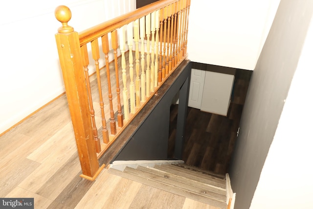9216 Crandall Rd, Lanham, MD 20706 - stairs featuring wood finished floors