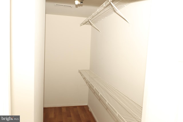9216 Crandall Rd, Lanham, MD 20706 - walk in closet featuring wood finished floors