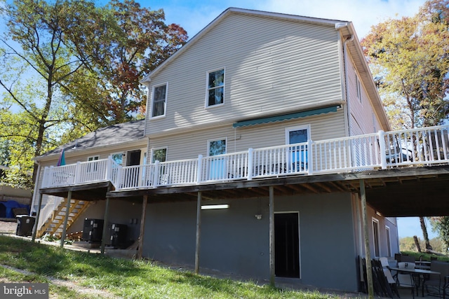9216 Crandall Rd, Lanham, MD 20706 - rear view of property featuring a wooden deck and stairs