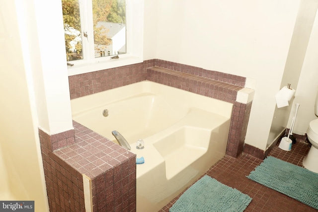 9216 Crandall Rd, Lanham, MD 20706 - bathroom with a bath and tile patterned flooring