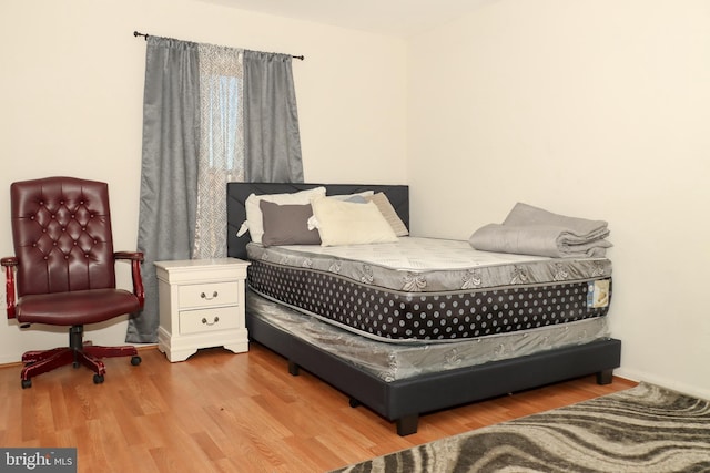 9216 Crandall Rd, Lanham, MD 20706 - bedroom featuring wood finished floors and baseboards