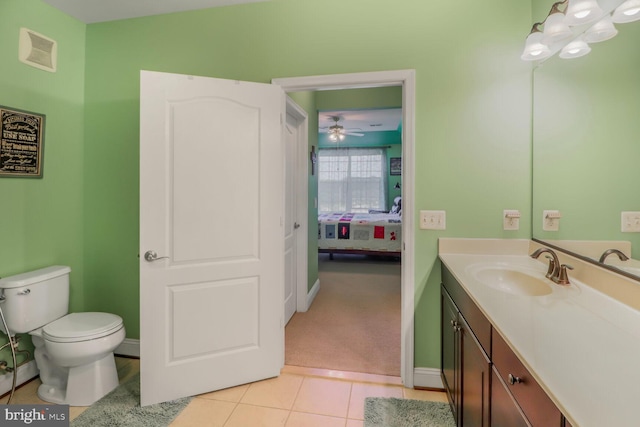 8612 Wintergreen Ct Unit 403, Odenton, MD 21113 - ensuite bathroom featuring vanity, toilet, baseboards, tile patterned flooring, and ceiling fan
