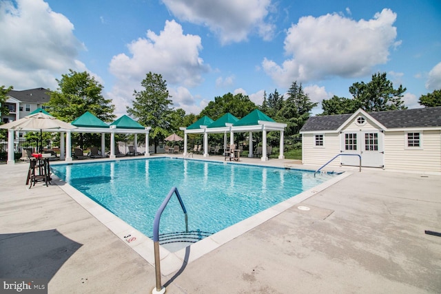 8612 Wintergreen Ct Unit 403, Odenton, MD 21113 - community pool with a gazebo, an outbuilding, and a patio