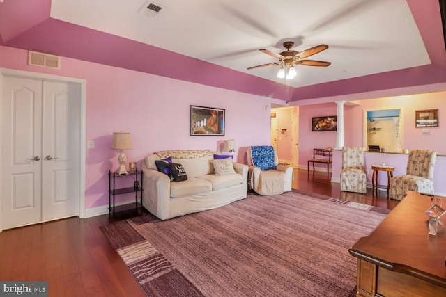8612 Wintergreen Ct Unit 403, Odenton, MD 21113 - living room with ornate columns, baseboards, ceiling fan, hardwood / wood-style flooring, and a tray ceiling