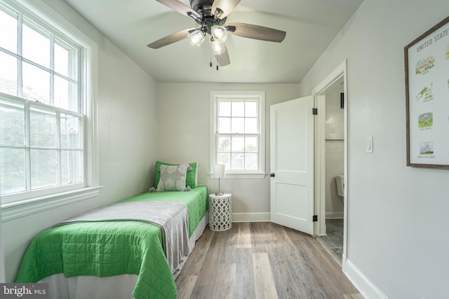 3232 N Rolling Rd, Baltimore, MD 21244 - bedroom with wood finished floors and a ceiling fan