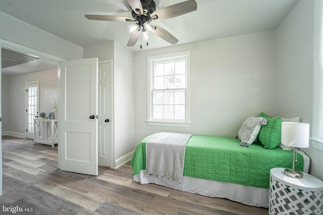3232 N Rolling Rd, Baltimore, MD 21244 - bedroom featuring wood finished floors and a ceiling fan