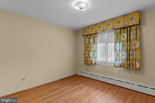645 Lily Rd, Warminster, PA 18974 - unfurnished room with baseboard heating and wood finished floors