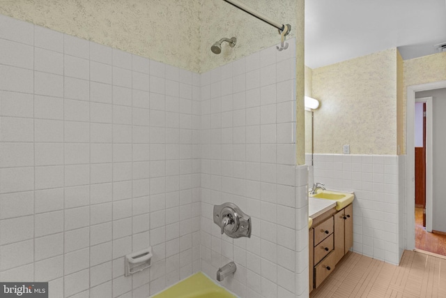 645 Lily Rd, Warminster, PA 18974 - full bathroom with shower / bath combination, vanity, tile walls, and a wainscoted wall