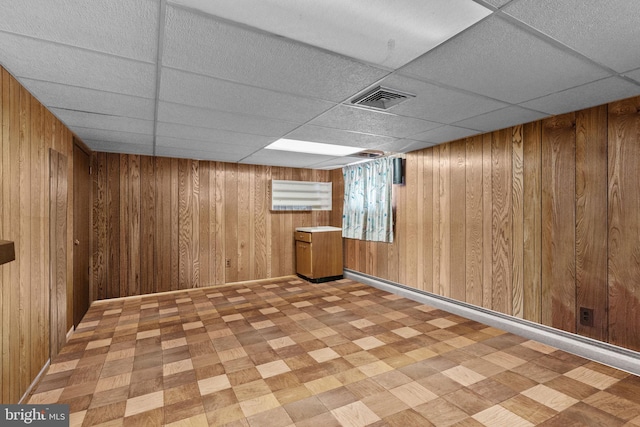 645 Lily Rd, Warminster, PA 18974 - finished below grade area with tile patterned floors, wood walls, and a drop ceiling