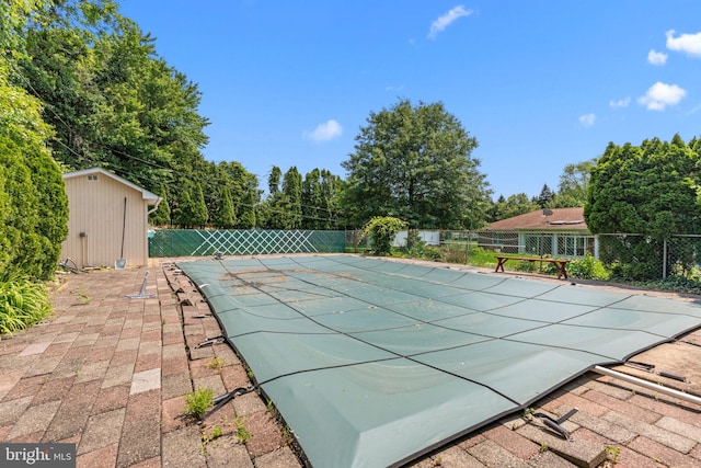 645 Lily Rd, Warminster, PA 18974 - view of swimming pool with view of wooded area and a patio