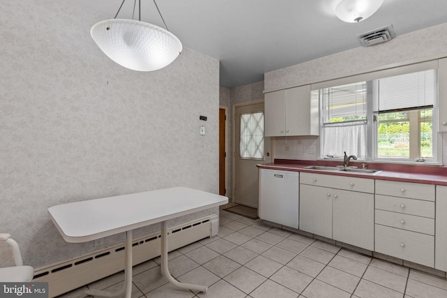 645 Lily Rd, Warminster, PA 18974 - kitchen with a sink, white dishwasher, a baseboard heating unit, light tile patterned floors, and decorative light fixtures