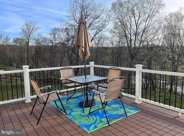 53 Shelduck Ln, Mechanicsburg, PA 17050 - deck with outdoor dining space and a view of trees