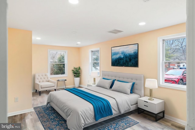136 Pemberton Browns Mill Rd, Browns Mills, NJ 08015 - bedroom featuring multiple windows, wood finished floors, baseboards, and recessed lighting
