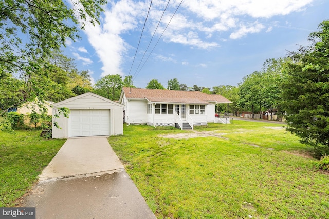 136 Pemberton Browns Mill Rd, Browns Mills, NJ 08015 - view of front of house with a garage, an outbuilding, driveway, and a front yard