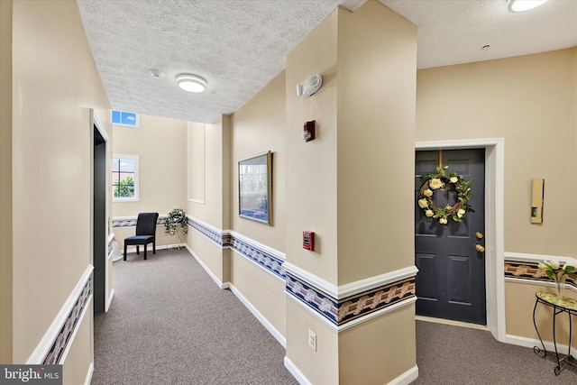 7 Brook Farm Ct Unit 7E, Perry Hall, MD 21128 - hallway with carpet flooring, a textured ceiling, and baseboards
