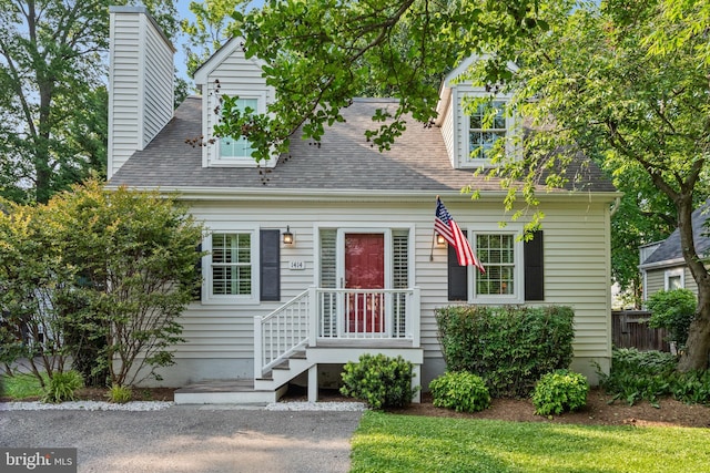 1414 Ellis Rd, Annapolis, MD 21403 - new england style home with a chimney and a shingled roof