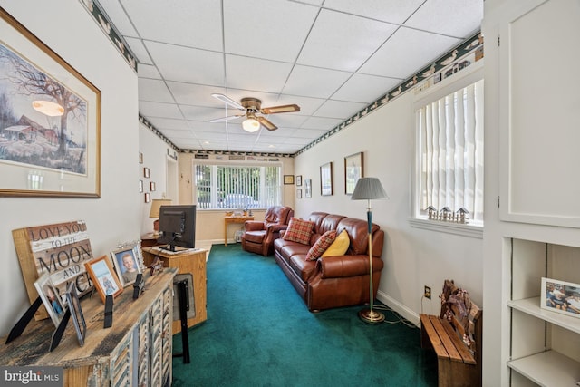 39 Stoney Run Rd, Wilmington, DE 19809 - carpeted living room featuring a paneled ceiling, ceiling fan, and baseboards