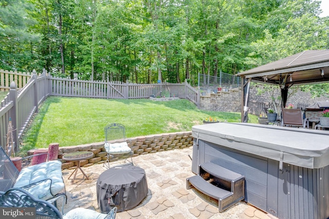3317 Eagle Ridge Dr, Woodbridge, VA 22191 - view of patio / terrace featuring a hot tub, a gazebo, and view of wooded area