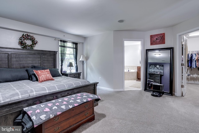 3317 Eagle Ridge Dr, Woodbridge, VA 22191 - bedroom featuring a spacious closet, carpet flooring, baseboards, a closet, and connected bathroom